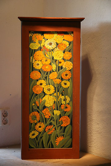 Maria Hillfons decorated cupboard.
